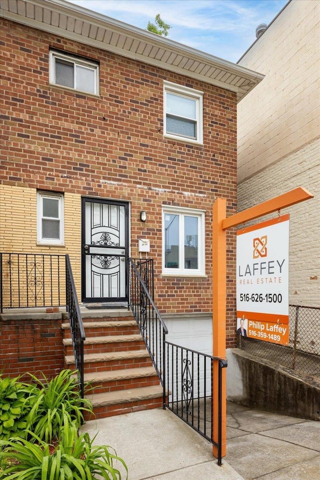 2533 Francis Lewis Blvd, Whitestone, NY 11358 - property entrance featuring brick siding