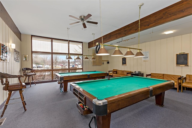 rec room with a wall of windows, billiards, ceiling fan, and carpet