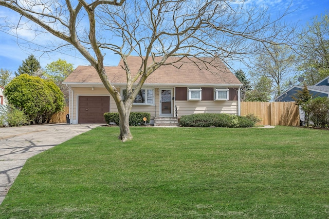 ranch-style home with fence, a front lawn, concrete driveway, an attached garage, and entry steps