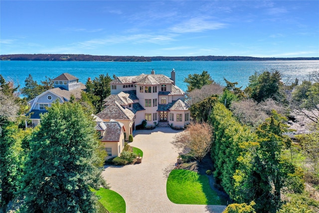 birds eye view of property featuring a water view