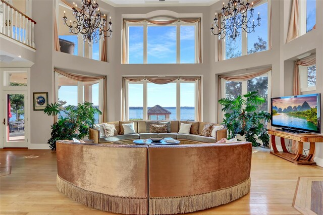 interior space with an inviting chandelier and a healthy amount of sunlight