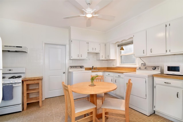 26 S Eckar St, Irvington, NY 10533 - kitchen featuring white appliances, custom range hood, decorative backsplash, white cabinetry, and crown molding