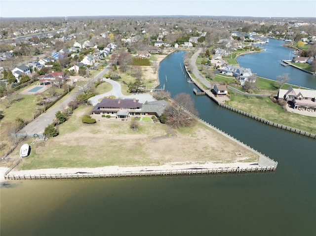 bird's eye view with a water view and a residential view