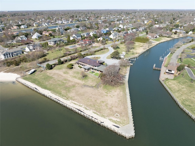 aerial view with a residential view and a water view