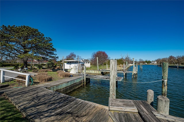 dock area featuring a water view