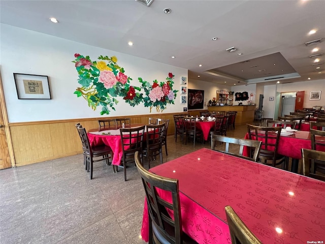 18-24 College Point Blvd, College Point, NY 11356 - dining space featuring wainscoting and wooden walls