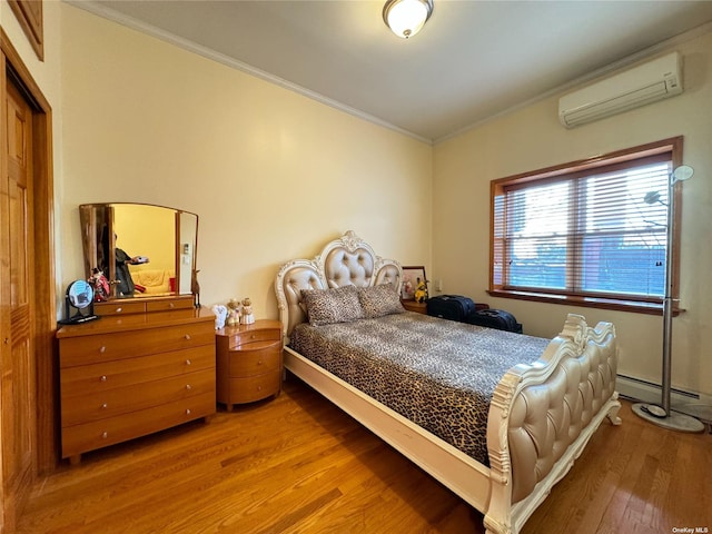 18-24 College Point Blvd, College Point, NY 11356 - bedroom featuring an AC wall unit, ornamental molding, wood finished floors, and a baseboard radiator