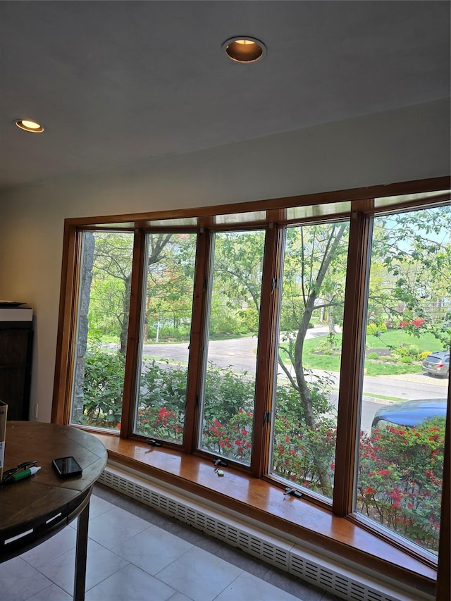 22 Lake Rd, Great Neck, NY 11020 - doorway to outside with recessed lighting, baseboard heating, and tile patterned flooring