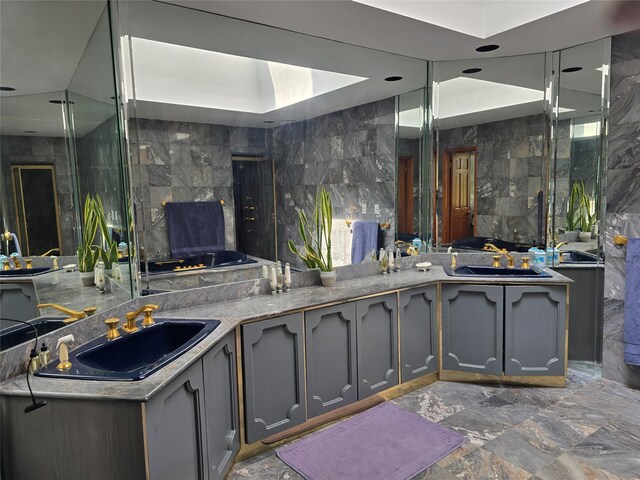 22 Lake Rd, Great Neck, NY 11020 - bathroom featuring double vanity and a sink