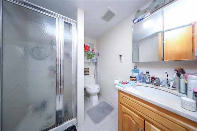 2250 E 23rd St, Brooklyn, NY 11229 - full bath featuring toilet, visible vents, a shower stall, and tile patterned floors