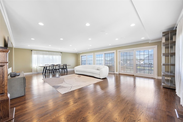 83 Central Ave, Amityville, NY 11701 - living room with crown molding, recessed lighting, wood finished floors, and plenty of natural light