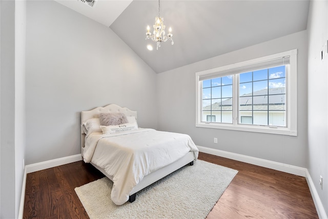 83 Central Ave, Amityville, NY 11701 - bedroom featuring lofted ceiling, a notable chandelier, and baseboards