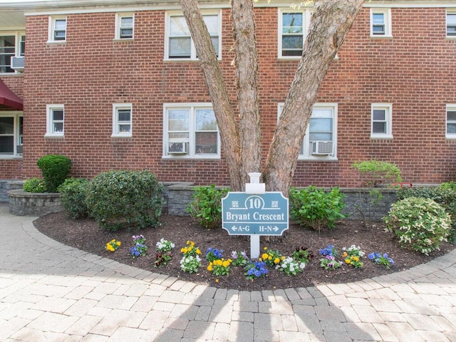 view of home's exterior with brick siding
