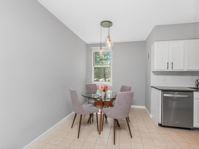 dining room with baseboards