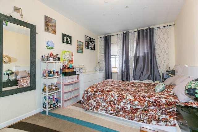 108-27 63rd Ave Unit 4B, Forest Hills, NY 11375 - bedroom with carpet flooring and baseboards