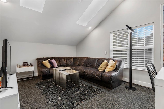 living room with recessed lighting, baseboards, and lofted ceiling with skylight