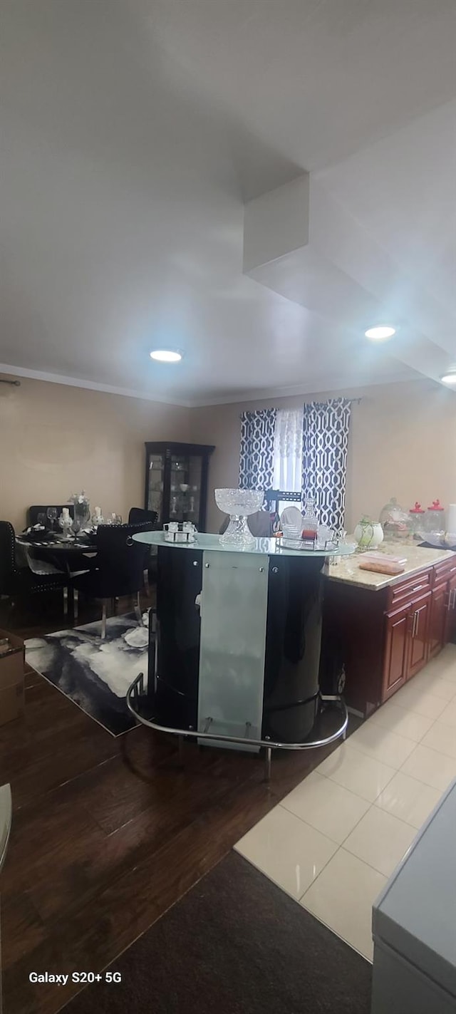 laundry room with dark wood-style floors