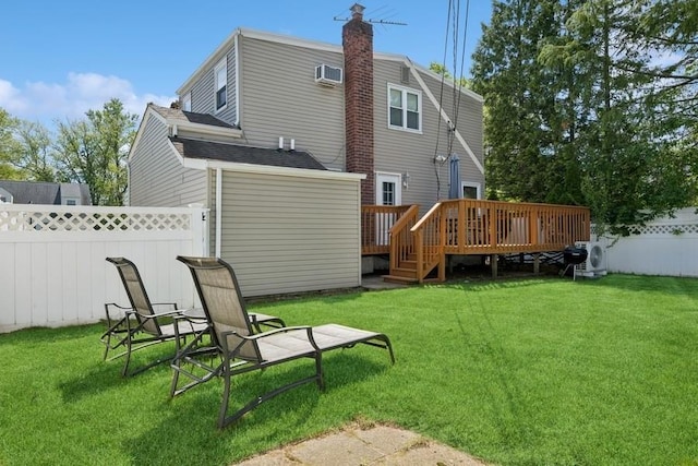 37 Remson St, Valley Stream, NY 11580 - back of house with a wooden deck and a chimney