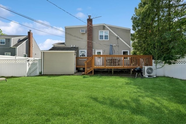 37 Remson St, Valley Stream, NY 11580 - rear view of house with a cooling unit, a wooden deck, and a chimney