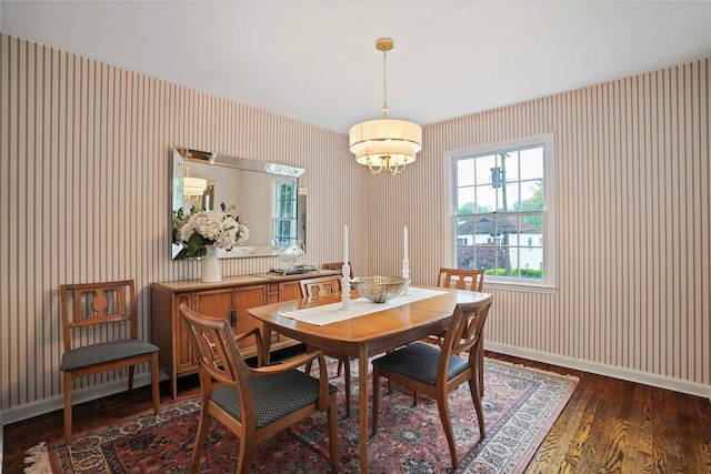 23 Hilldale Rd, Dobbs Ferry, NY 10522 - dining space featuring wallpapered walls, dark wood finished floors, plenty of natural light, baseboards, and a chandelier
