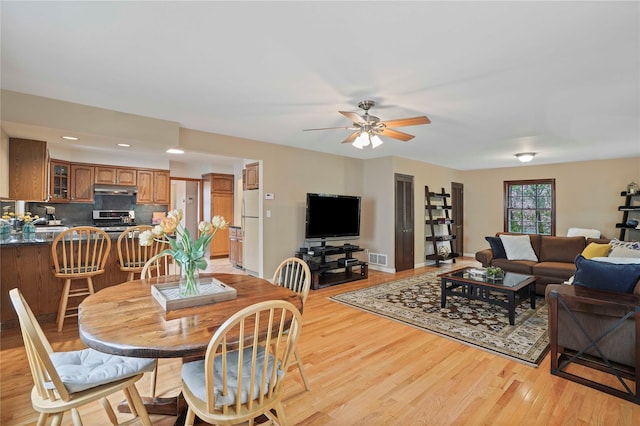 23 Hilldale Rd, Dobbs Ferry, NY 10522 - dining room featuring light wood-type flooring, a ceiling fan, and recessed lighting