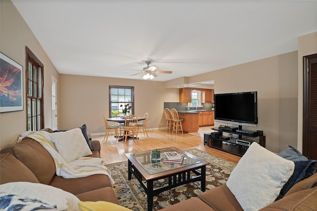 23 Hilldale Rd, Dobbs Ferry, NY 10522 - living area with light wood-style floors, ceiling fan, and baseboards