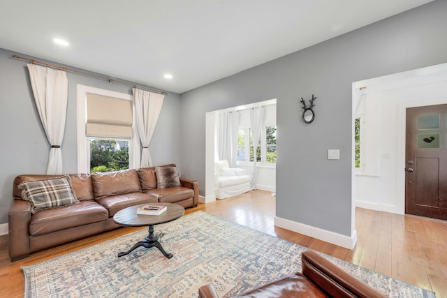 92 Ridgewood Ave, Yonkers, NY 10704 - living area with baseboards, recessed lighting, light wood finished floors, and a healthy amount of sunlight