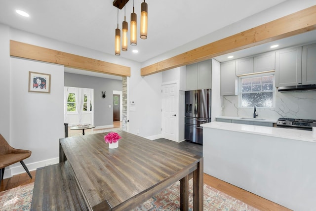 92 Ridgewood Ave, Yonkers, NY 10704 - dining room featuring baseboards, dark wood-style flooring, and recessed lighting