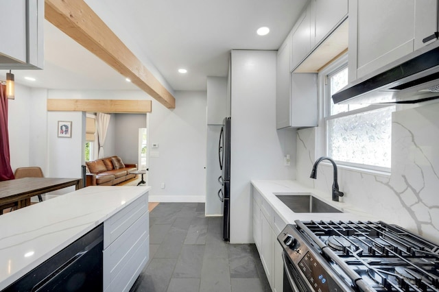92 Ridgewood Ave, Yonkers, NY 10704 - kitchen featuring a sink, appliances with stainless steel finishes, recessed lighting, and light stone counters
