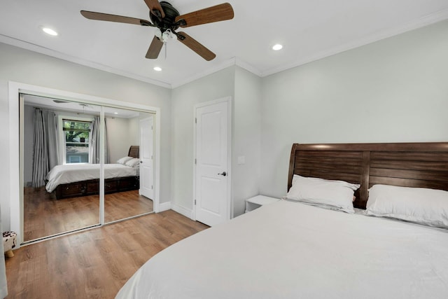 92 Ridgewood Ave, Yonkers, NY 10704 - bedroom with crown molding, ceiling fan, recessed lighting, wood finished floors, and a closet