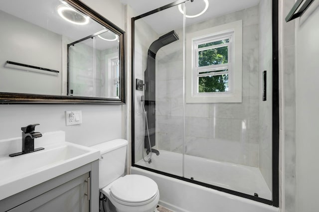 92 Ridgewood Ave, Yonkers, NY 10704 - bathroom featuring vanity, enclosed tub / shower combo, and toilet
