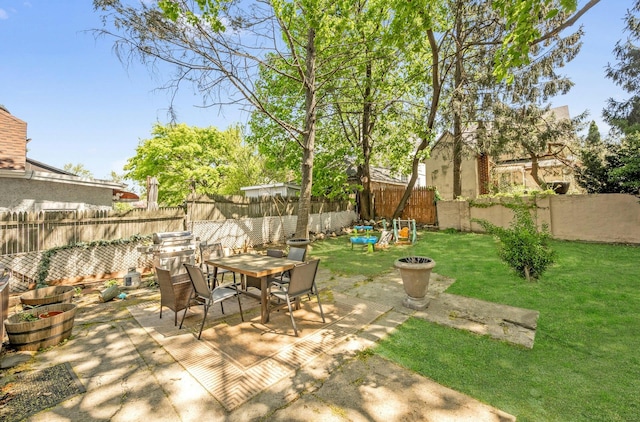 92 Ridgewood Ave, Yonkers, NY 10704 - view of patio with outdoor dining area and a fenced backyard