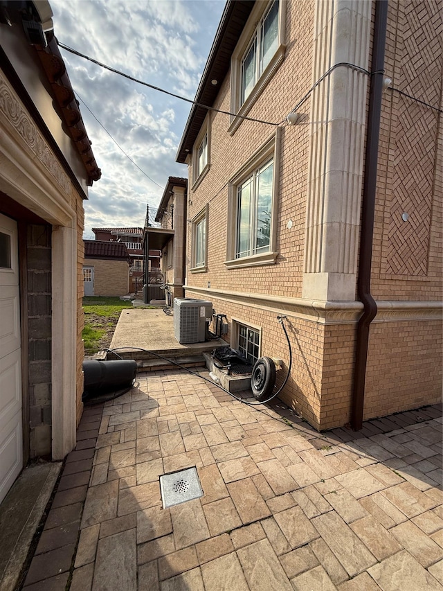 view of patio / terrace with central air condition unit