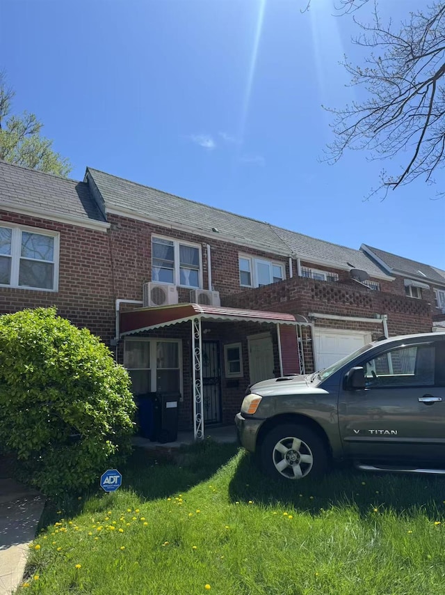 25-19 120th St, College Point, NY 11356 - multi unit property featuring a front lawn and brick siding