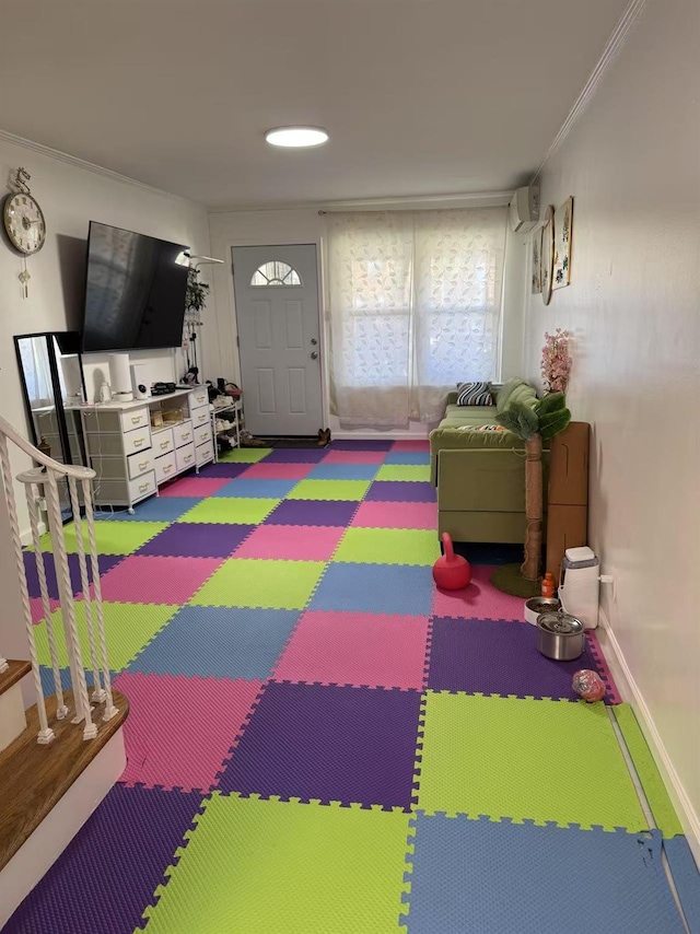 25-19 120th St, College Point, NY 11356 - playroom featuring ornamental molding, an AC wall unit, and baseboards