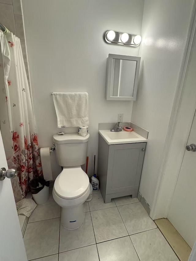 25-19 120th St, College Point, NY 11356 - bathroom with toilet, tile patterned floors, curtained shower, and vanity