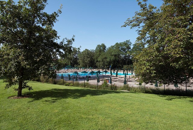 5800 Arlington Ave Unit 10R, Bronx, NY 10471 - exterior space featuring a community pool and fence