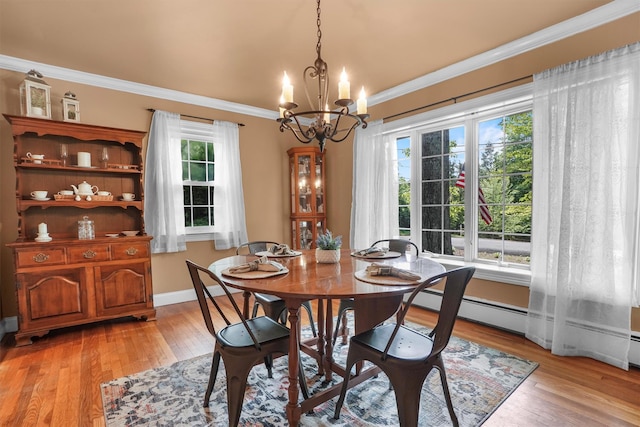 2 Jean Way, Purdys, NY 10578 - dining area featuring a chandelier, ornamental molding, light wood-style flooring, and baseboards