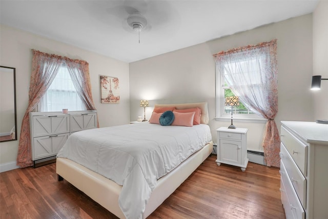 2 Jean Way, Purdys, NY 10578 - bedroom featuring wood finished floors, a baseboard radiator, a ceiling fan, and baseboards