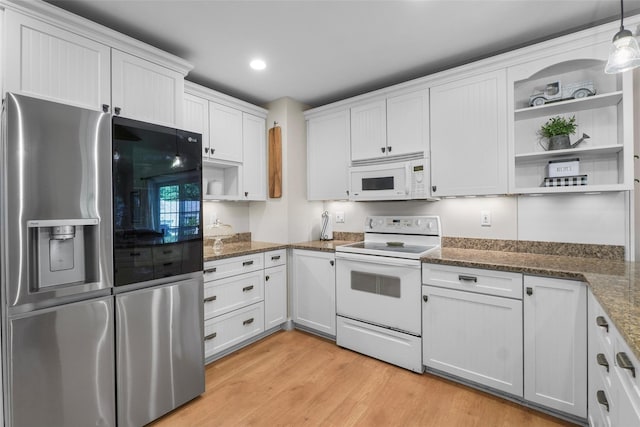 2 Jean Way, Purdys, NY 10578 - kitchen with white appliances, open shelves, light wood-style floors, white cabinets, and dark stone counters