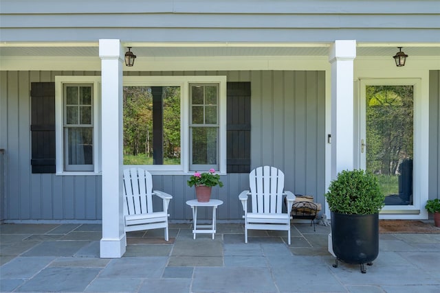 doorway to property featuring a porch