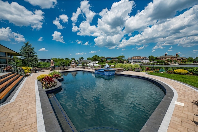136 The Helm, East Islip, NY 11730 - view of swimming pool featuring a pool with connected hot tub