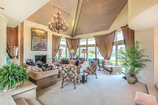 136 The Helm, East Islip, NY 11730 - living room featuring high vaulted ceiling, a chandelier, healthy amount of natural light, carpet, and a fireplace