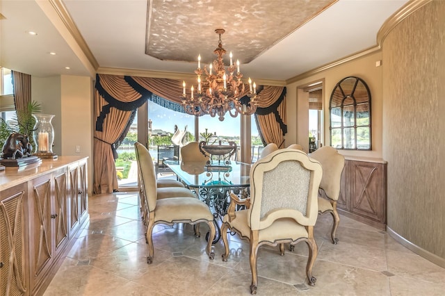136 The Helm, East Islip, NY 11730 - dining room with a chandelier, healthy amount of natural light, a raised ceiling, ornamental molding, and light tile patterned flooring