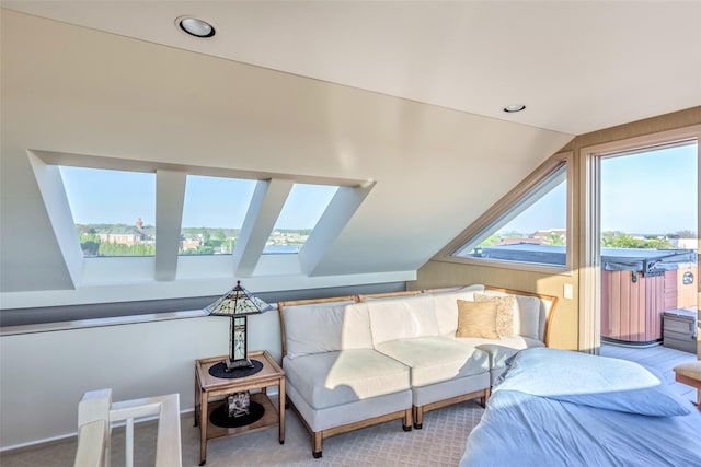 136 The Helm, East Islip, NY 11730 - bedroom featuring a skylight, vaulted ceiling, carpet floors, and recessed lighting