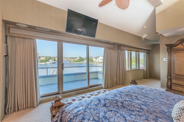 136 The Helm, East Islip, NY 11730 - bedroom with light carpet, access to exterior, and lofted ceiling