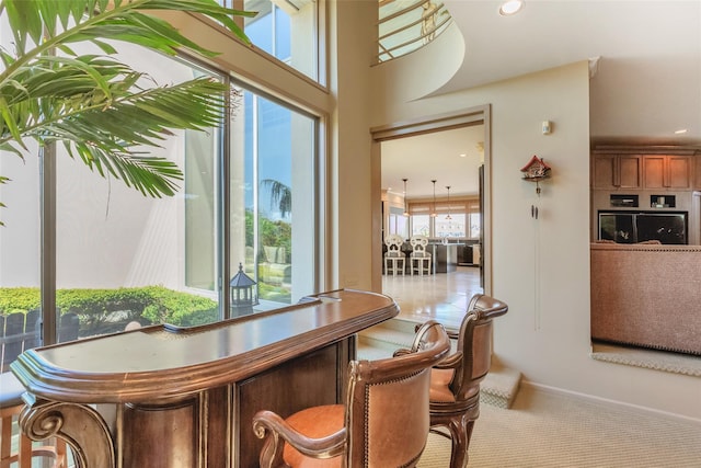 136 The Helm, East Islip, NY 11730 - indoor dry bar featuring recessed lighting and carpet floors