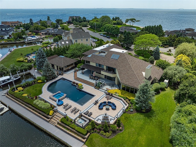 136 The Helm, East Islip, NY 11730 - aerial perspective of suburban area featuring a large body of water and a pool