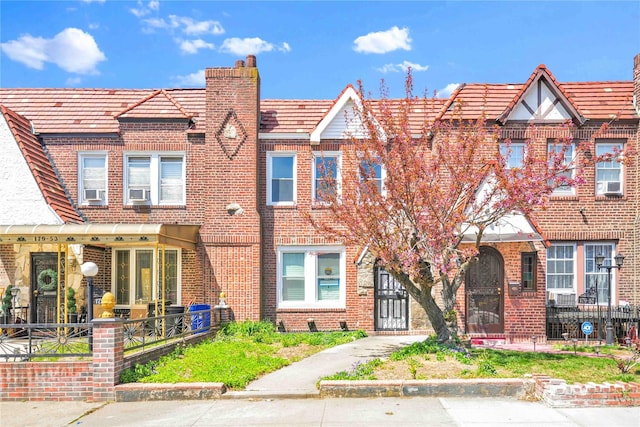 179-55 Anderson Rd, Jamaica, NY 11434 - townhome / multi-family property featuring a chimney and brick siding