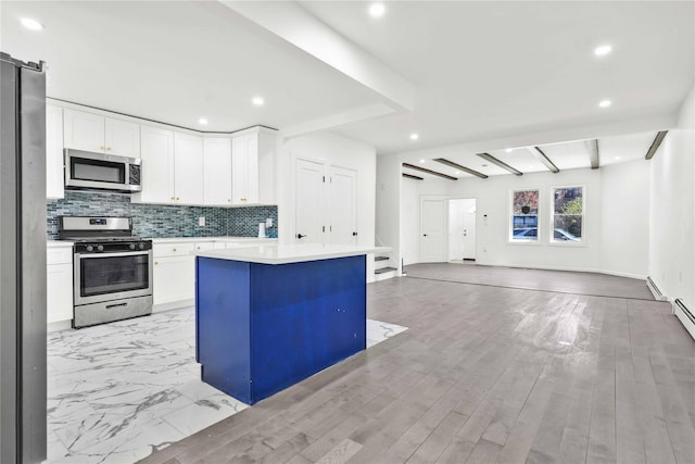 179-55 Anderson Rd, Jamaica, NY 11434 - kitchen with open floor plan, stainless steel appliances, recessed lighting, and a kitchen island